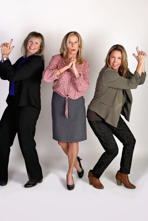 Three women posing for fun photo